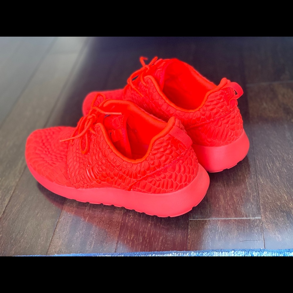 NWOT Nike limited edition bright orange sneaker